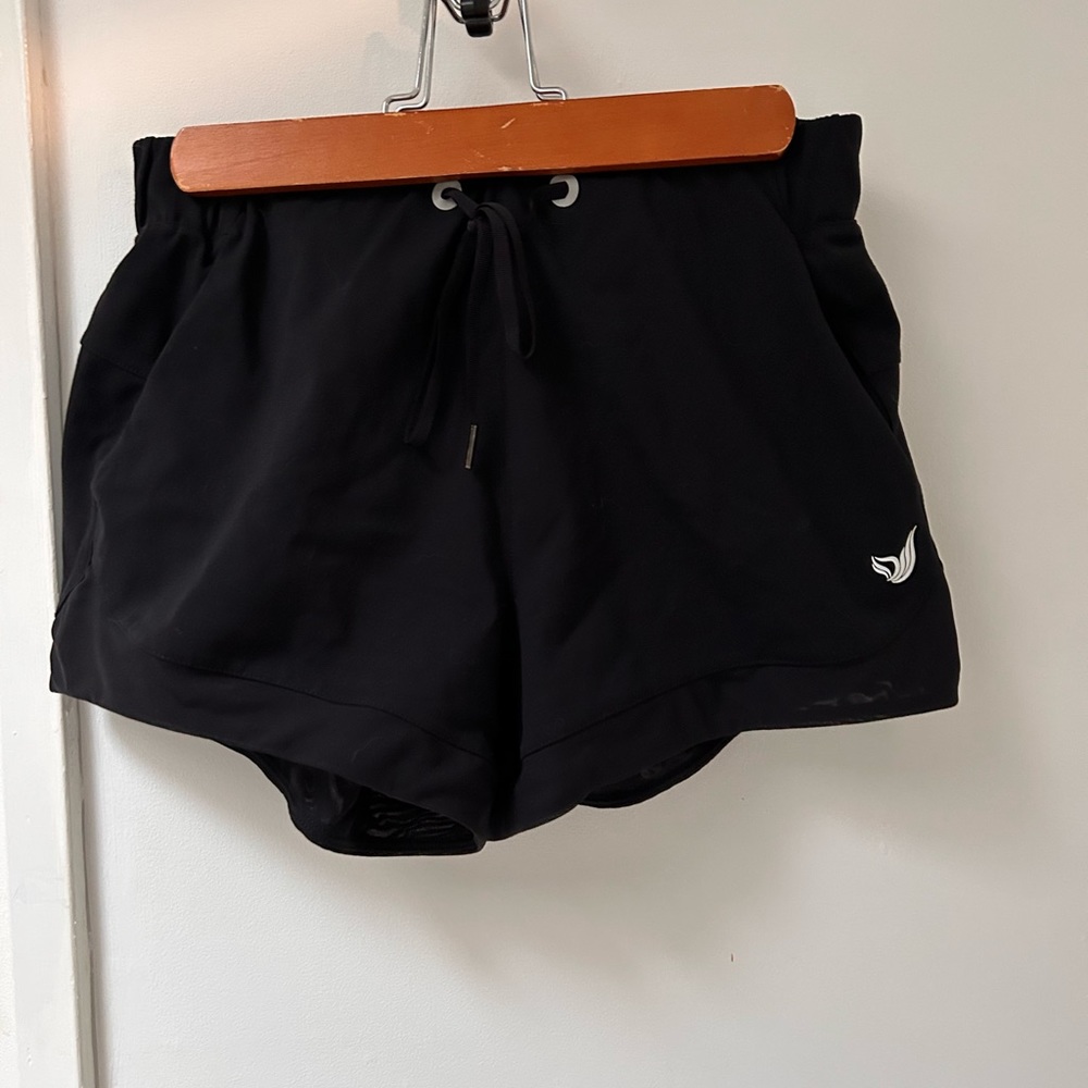 Devotee Wear black shorts, size small